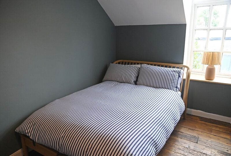 Upstairs are three bedrooms in subtle Farrow &amp; Ball colours.