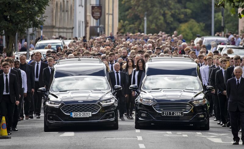 The cortege makes its way to church. Picture: Colin Keegan, Collins Dublin The cortege makes its way to church. Picture: Colin Keegan, Collins Dublin