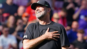 <p>HAND ON HEART: Liverpool manager Jurgen Klopp salutes the fans. Picture: Peter Byrne/PA Wire.</p>