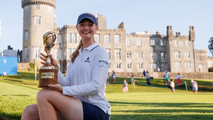 <p>MAIDEN TITLE: Denmark’s Smilla Tarning Soenderby celebrates with the Women's Irish Open trophy. Pic: ©INPHO/Ben Brady</p>