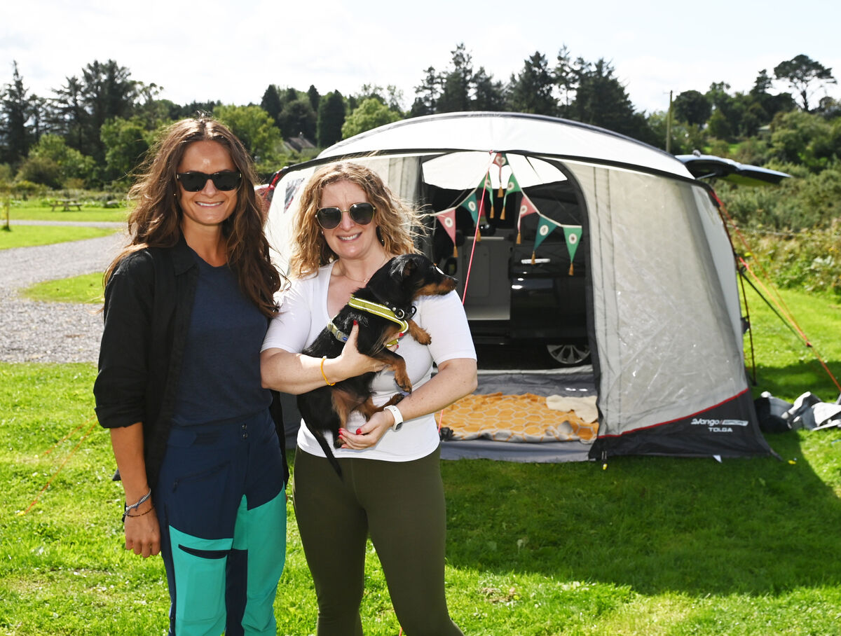 Jennifer Sheahan (right) her dog Perry with her friend Martine Drevvatne at The Getaway in Dungarvan. 