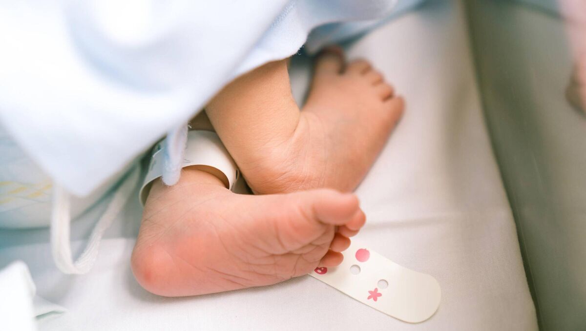 Within 10 pushes, the baby is here, landing into our lives at 21:24. Picture: iStock