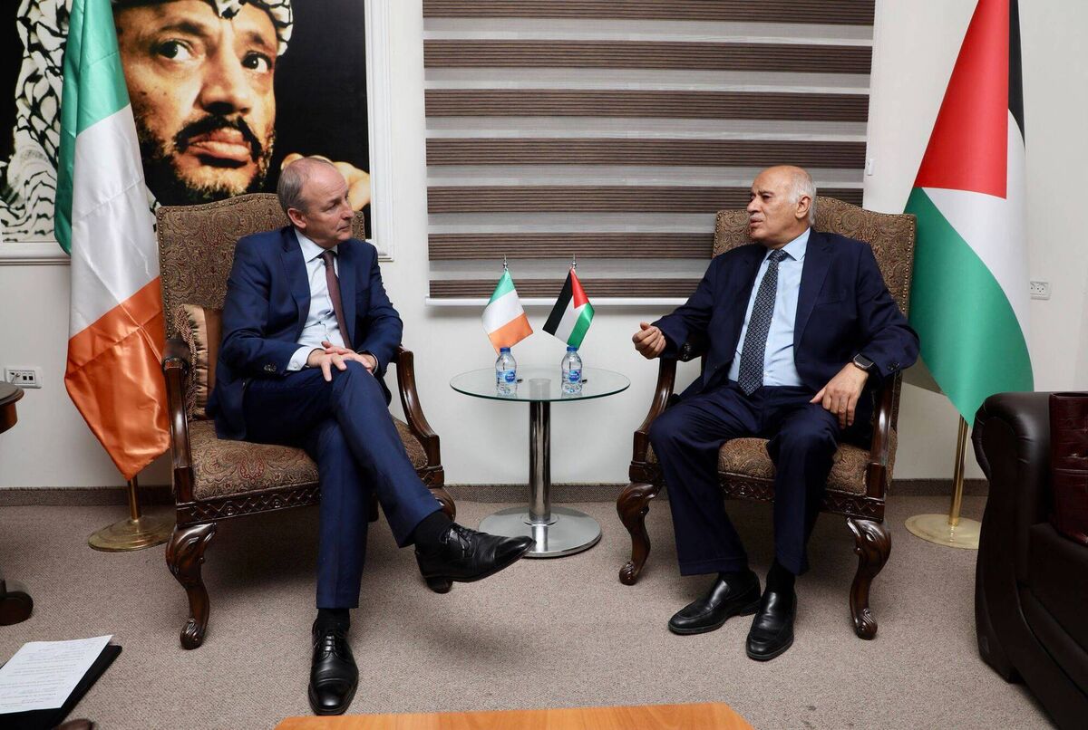 Palestinian acting education minister Mahmoud Mosa Abu Mouis chats to Tánaiste Micheál Martin.