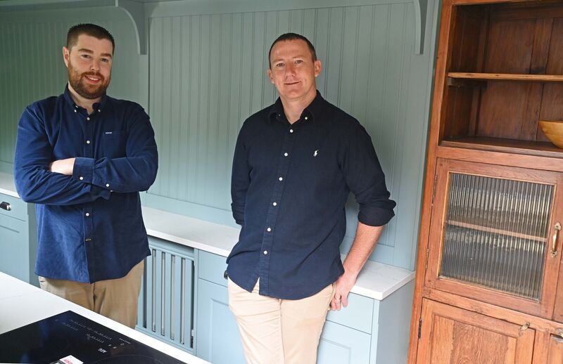 Martin and David  in their kitchen.