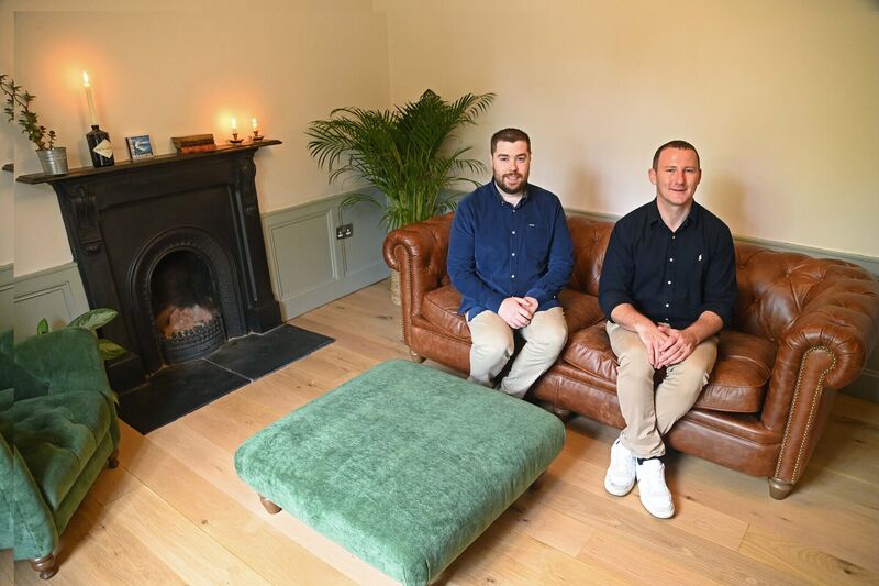 Martin and David in their front room. 