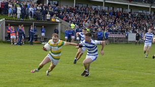 <p>WEST CORK'S FINEST: Carbery Rangers' Darragh Hayes holding off Castlehaven's Ronan Walsh. Pic: Denis Boyle</p>