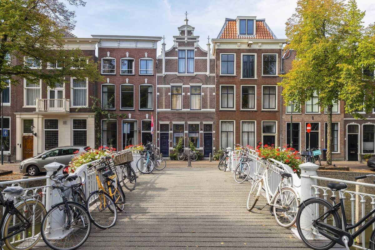 Most bike storage in the Netherlands is outdoors, such as ner these canal houses on the Westhaven in the historic city of Gouda.