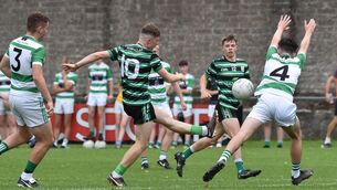 <p>FINAL COUNTDOWN: Ronan Dooley, Douglas kicking a point past Donagh Shiels, Valley Rovers in the Rebel Óg Premier 1 MFC semi-final at the Mardyke , Cork. Picture Dan Linehan</p>