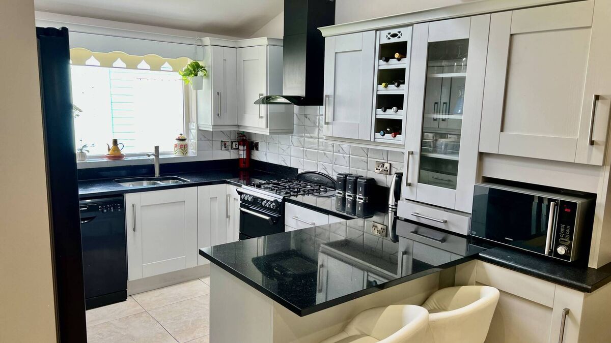 Kitchen with granite tops Kitchen with granite tops