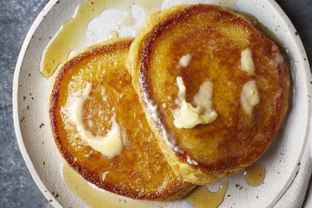 Best Ever Cornmeal Pancakes with Butter and Maple Syrup