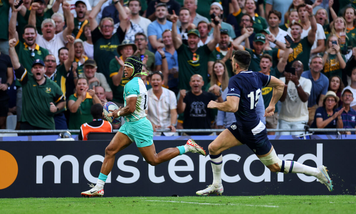 South Africa’s Kurt-Lee Arendse runs in to score a try.