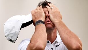 <p>TOUGH FINISH: Northern Ireland’s Rory McIlroy dejected after finishing his round. Pic Credit ©INPHO/Ben Brady</p>