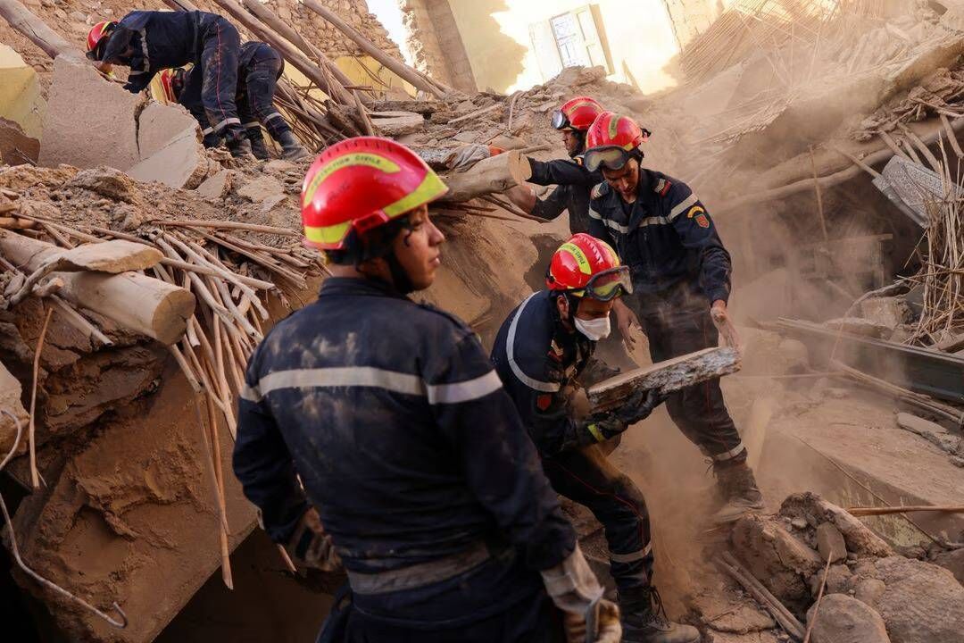 Emergency crews work, in the aftermath of a deadly earthquake, in Amizmiz, Morocco on Sunday Picture: Reuters