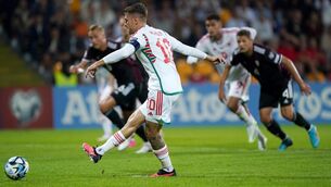 <p>Wales’ Aaron Ramsey scores his side’s opener against Latvia (Tim Goode/PA)</p>