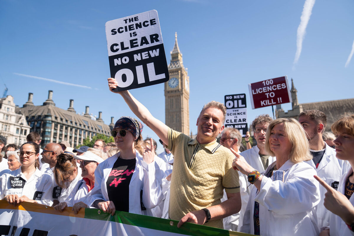 Conservationist and TV presenter Chris Packham and scientists gather outside the Houses of Parliament, London, after having written to MPs demanding the Government not support new oil and gas developments.