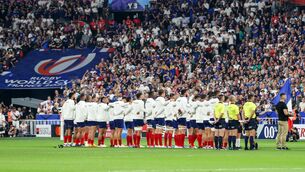 <p>OUT OF SYNC: The France team stand for the national anthem. Pic: INPHO/Laszlo Geczo</p>