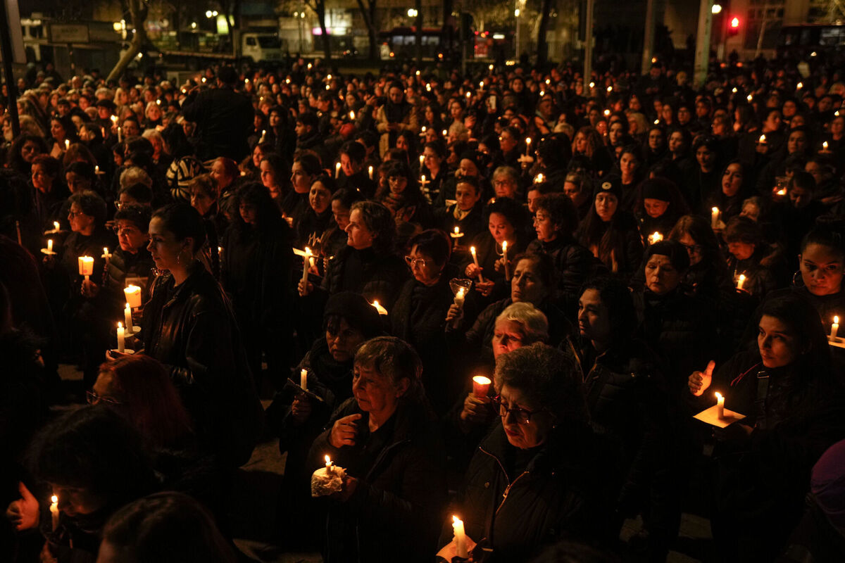 Women's rights activists at a 50th anniversary vigil in Santiago for the victims of Augusto Pinochet's regime which seized power in Chile on September 11, 1973. Picture: Esteban Felix/AP