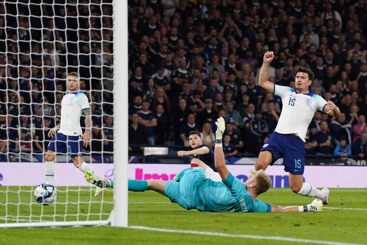 England's Harry Maguire scores an own goal during the international friendly match at Hampden Park, Glasgow.