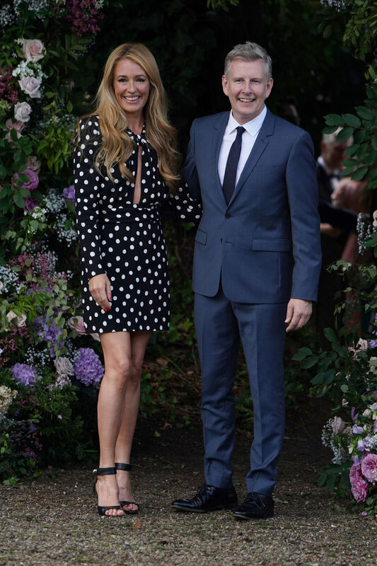Cat Deeley and Patrick Kielty at St Michael's church, Heckfield in Hampshire, for the wedding of Anthony McPartlin to Anne-Marie Corbett. Picture: Andrew Matthews/PA Wire