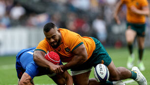 <p>STRAIN PAIN: Australia's Taniela Tupou. Pic: ©INPHO/James Crombie</p>