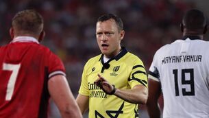 <p>MAN IN THE MIDDLE: English referee Matthew Carley during the Pool C match between Wales and Fiji. Picture: ROMAIN PERROCHEAU/AFP via Getty Images</p>