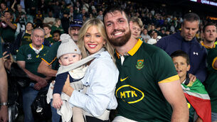 <p>ALL AROUND THE WORLD: South Africa's Jean Kleyn with wife Aisling and son Eli Noah. Pic: ©INPHO/Laszlo Geczo</p>