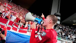 <p>RAPID RISE: Denmark's forward #21 Rasmus Hojlund celebrates with the fans after the UEFA EURO 2024 qualifying football match against Finland. Pic: Mads Claus Rasmussen / Ritzau Scanpix / AFP via Getty Images)</p>