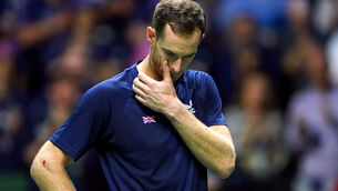 <p>Andy Murray wipes away tears during his on-court interview. Pic:Martin Rickett/PA</p>