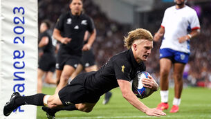 <p>Damian McKenzie scored two tries as New Zealand romped past Namibia in Pool A. Pic: Adam Davy/PA</p>
