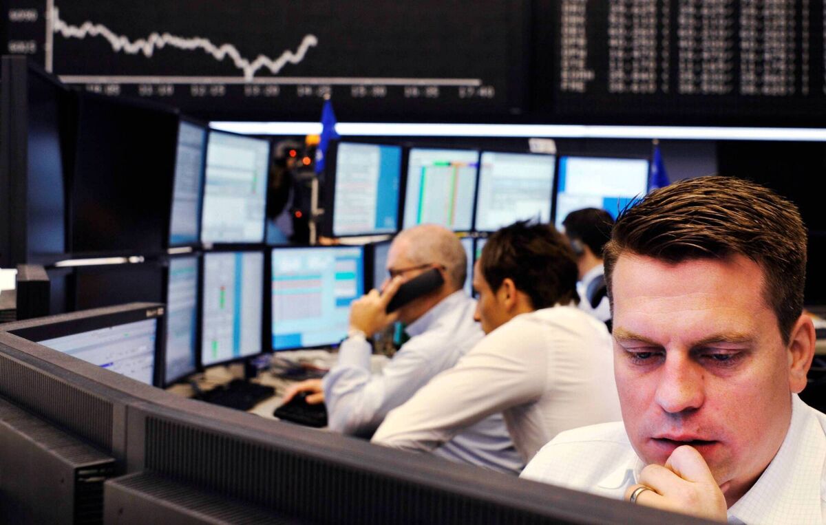 Brokers at Frankfurt's stock exchange anxiously study their screens on September 15, 2008, as world economies wobbled in the wake of Lehman Brothers filing for bankruptcy. Picture: Thomas Lohnes/AFP/Getty Brokers at Frankfurt's stock exchange anxiously study their screens on September 15, 2008, as world economies wobbled in the wake of Lehman Brothers filing for bankruptcy. Picture: Thomas Lohnes/AFP/Getty