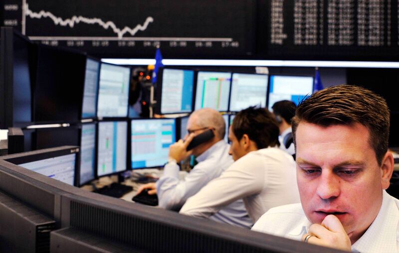 Brokers at Frankfurt's stock exchange anxiously study their screens on September 15, 2008, as world economies wobbled in the wake of Lehman Brothers filing for bankruptcy. Picture: Thomas Lohnes/AFP/Getty Brokers at Frankfurt's stock exchange anxiously study their screens on September 15, 2008, as world economies wobbled in the wake of Lehman Brothers filing for bankruptcy. Picture: Thomas Lohnes/AFP/Getty