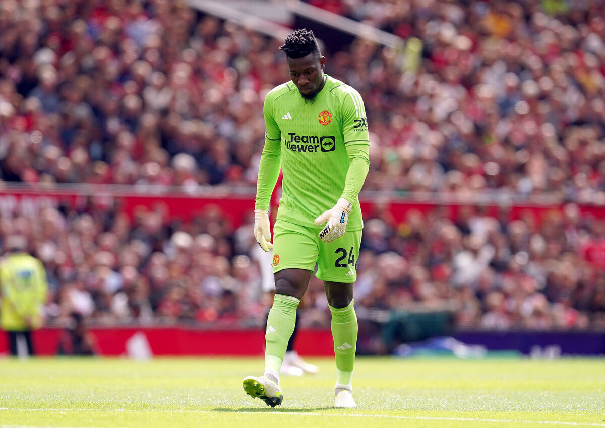 Manchester United goalkeeper Andre Onana reacts after conceding a second goal during the Premier League match at Old Trafford.