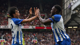 <p>Brighton and Hove Albion's Danny Welbeck (right) celebrates with Kaoru Mitoma after scoring their side's first goal of the game during the Premier League match at Old Trafford, Manchester. Picture: Martin Rickett/PA Wire </p>