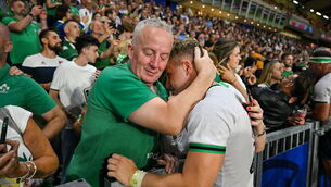 <p>Craig Casey of Ireland with his father Ger after his side's victory in the 2023 Rugby World Cup Pool B match between Ireland and Tonga at Stade de la Beaujoire in Nantes, France. Photo by Brendan Moran/Sportsfile</p>