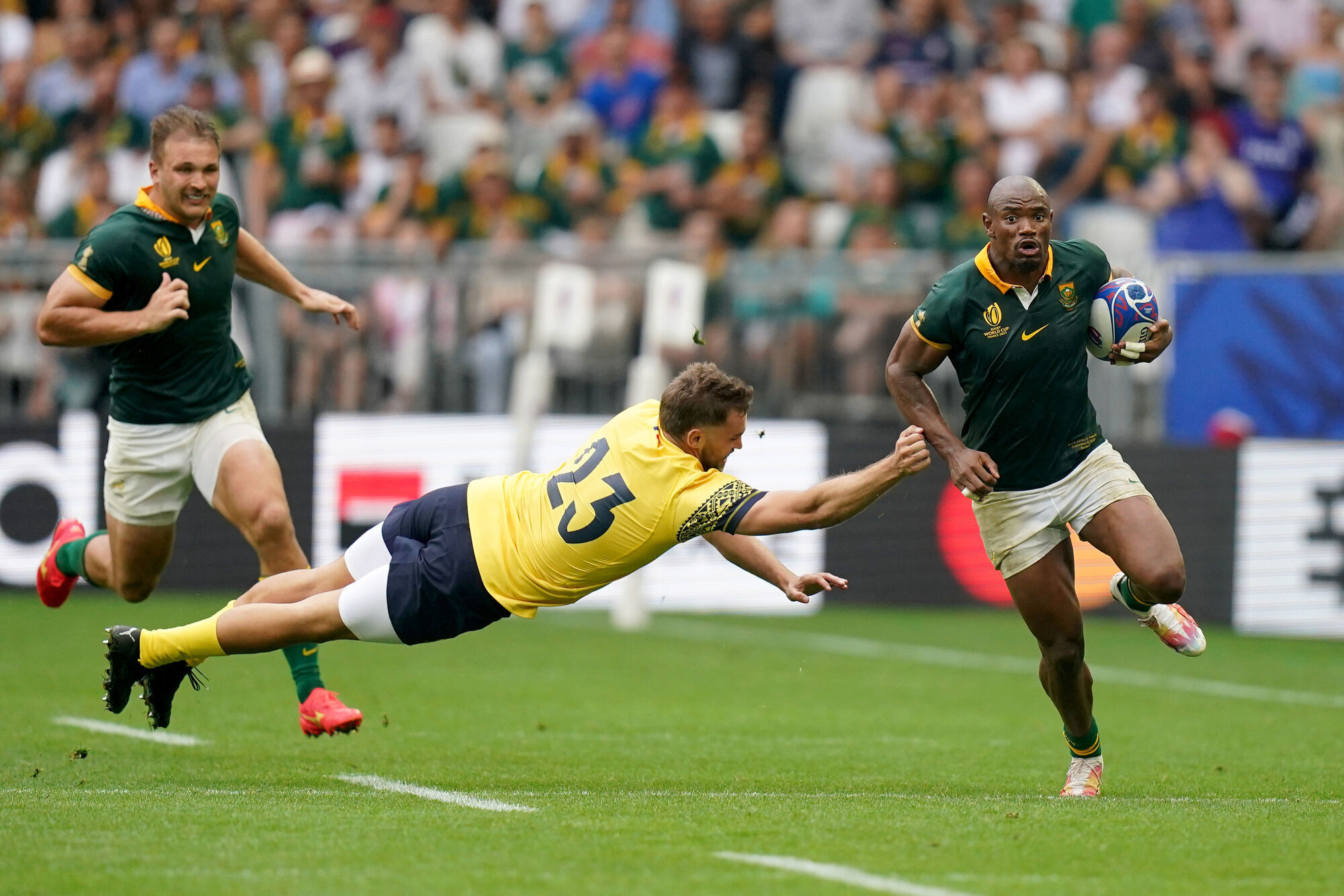 South Africa's Makazole Mapimpi (right) gets away from Romania's Gabriel Pop during the Rugby World Cup 2023, Pool B match at the Matmut Atlantique Stadium, France. Picture: Adam Davy/PA Wire 