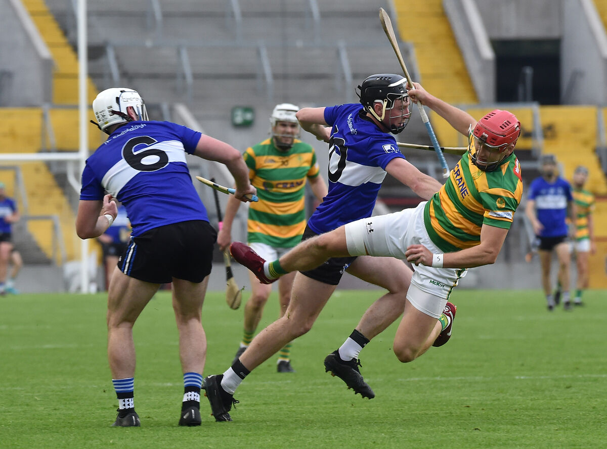 Alan Connolly, Blackrock flying through the air after this clash with Sarsfields players Eoghan Murphy and Jack O'Connor. Pic: Dan Linehan Alan Connolly, Blackrock flying through the air after this clash with Sarsfields players Eoghan Murphy and Jack O'Connor. Pic: Dan Linehan