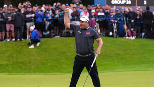Ryan Fox celebrates his putt on the 18th green (John Walton/PA)