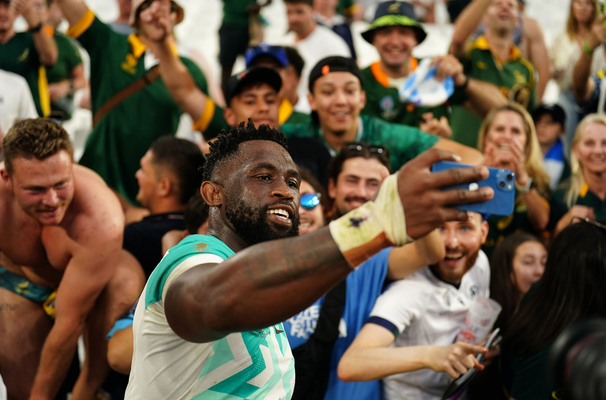 HEARTBEAT: South Africa's Siya Kolisi takes a selfie with fans. Pic: Mike Egerton/PA Wire.