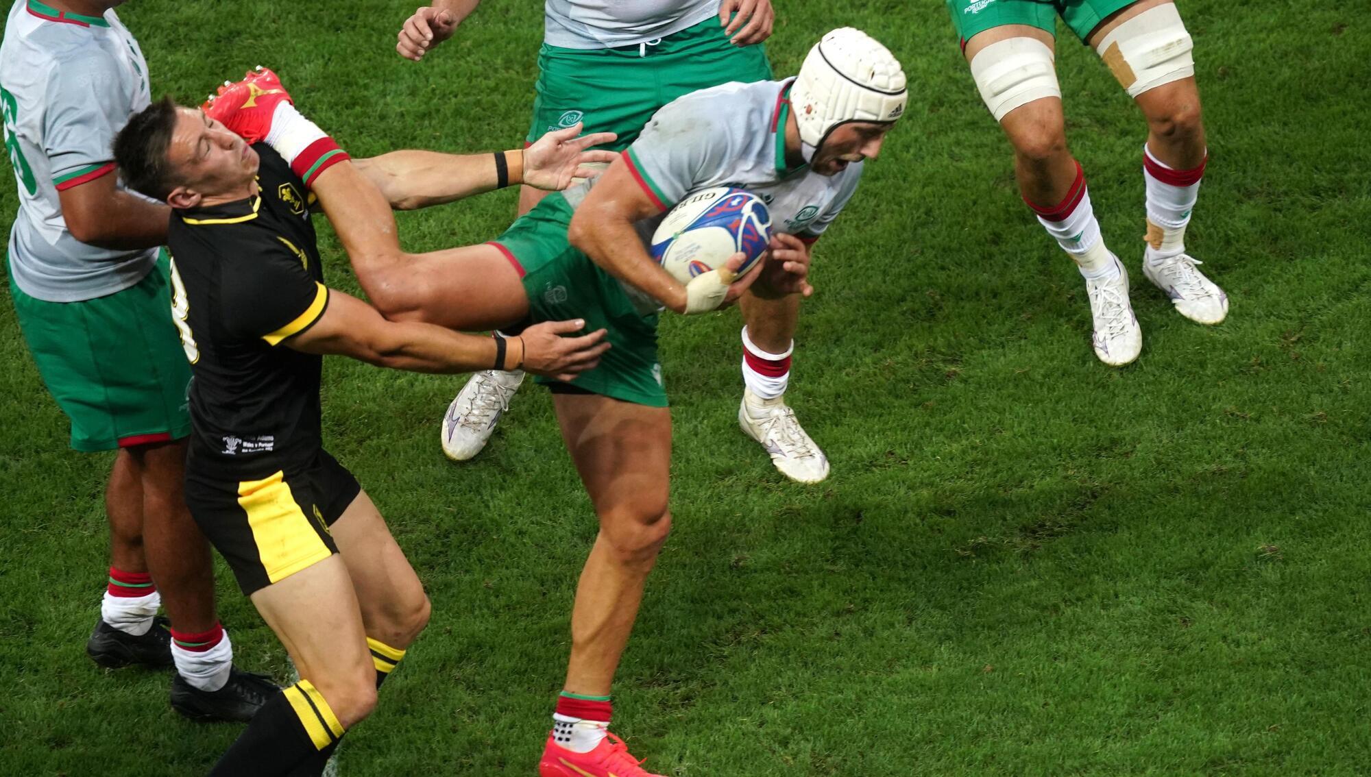 SCRAP TMO?: Portugal's Vincent Pinto kicks Wales' Josh Adams. Photo credit: David Davies/PA Wire