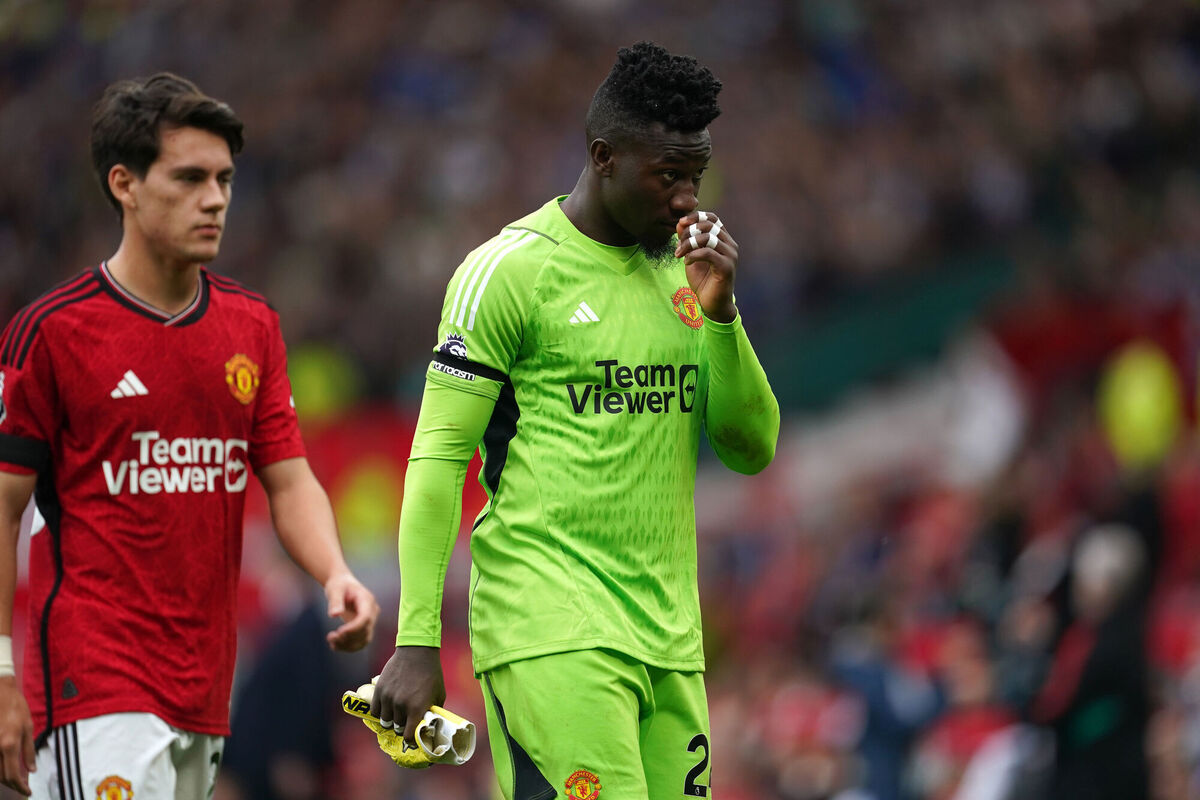 Manchester United goalkeeper Andre Onana appears dejected after the Premier League match at Old Trafford.