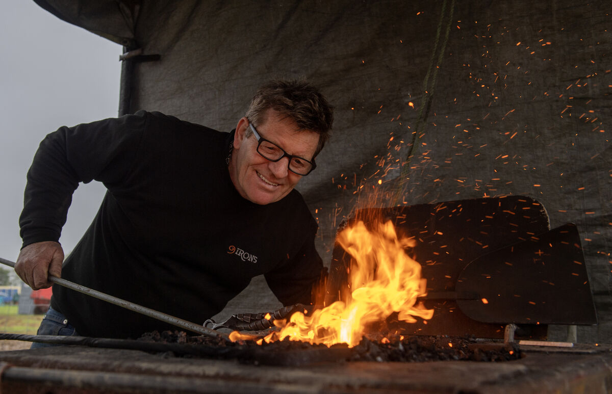 Blacksmith Patrick Strahan of the Barroerock Forge sets up for the first day of the National Ploughing Championships. Picture: Dan Linehan