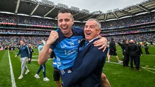 <p>John Costello celebrates with his son Cormac Costello after Dublin’s most recent All-Ireland triumph. <span class="contextmenu emphasis CaptionCredit">Picture: David Fitzgerald/Sportsfile</span>
            </p>
