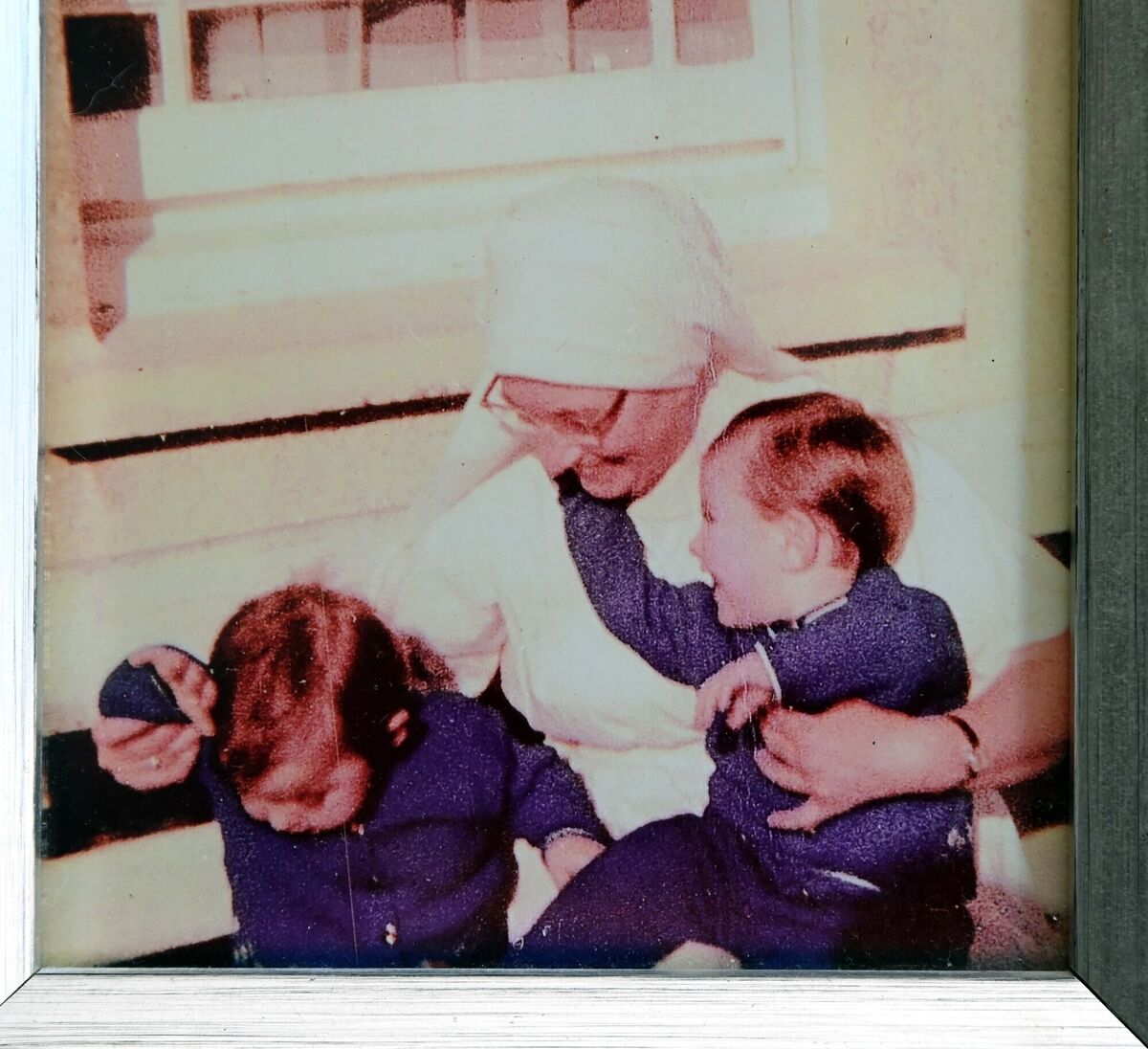 Paul Lynch (right) and his twin brother Gerard with Sr Norbid when they were children in the Mother and Baby Home. Picture copied by Denis Minihane