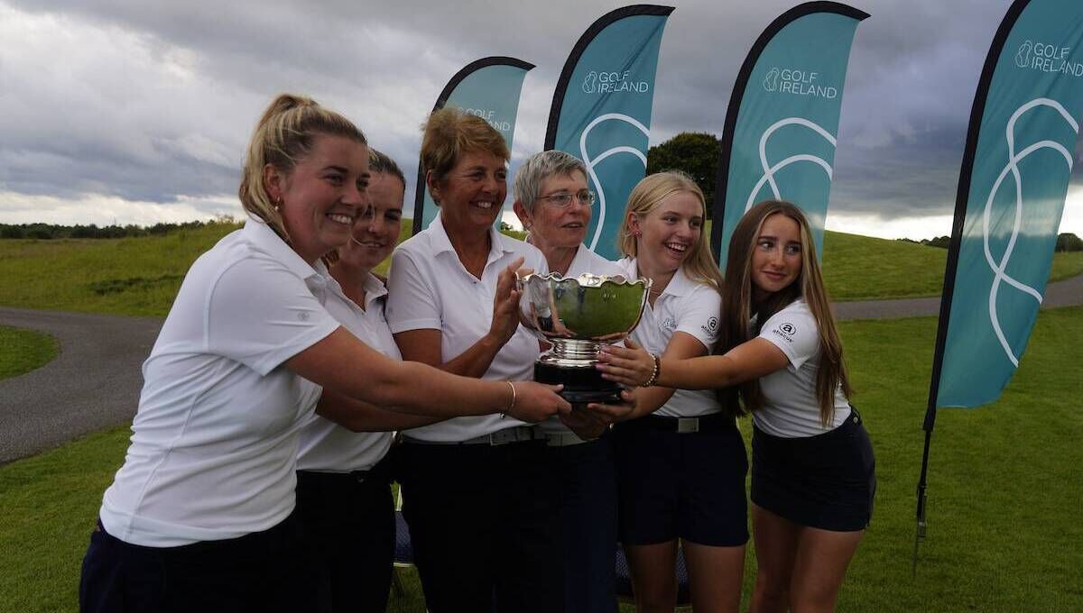 Judithe Allen with some of the Ulster team after their interprovincial success at Moyvalley. 