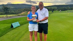 <p>Judithe Allen with her father, Gary, after Royal Portrush won the AIG Women's Senior Cup at Dun Laoghaire.</p>
