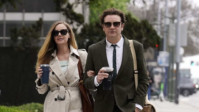 Danny Masterson, right, and his wife Bijou Phillips at a Los Angeles court in May (Chris Pizzello/AP)