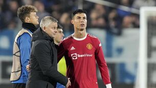 <p>Manchester United's manager Ole Gunnar Solskjaer approaches Manchester United's Cristiano Ronaldo at the end of the Champions League group F soccer match between Atalanta and Manchester United, at the Stadio di Bergamo, in Bergamo, Italy, Tuesday, Nov. 2, 2021. The game ended in a 2-2 draw. (AP Photo/Luca Bruno)</p>