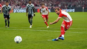 <p>KANE WELL ABLE: Bayern Munich's Harry Kane scores their side's third goal of the game. Photo credit: Nick Potts/PA Wire</p>