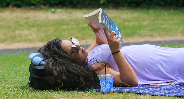 Khushali Kanjee from Co Down chills out during the good weather in St Stephen’s Green, Dublin. Picture: Gareth Chaney Collins Khushali Kanjee from Co Down chills out during the good weather in St Stephen’s Green, Dublin. Picture: Gareth Chaney Collins
