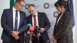 <p>GRA president Brendan O'Connor, general secretary Ronan Slevin, and assistant to general secretary Tara McManus, announcing the outcome of the Garda Representative Association vote of no confidence in Commissioner Drew Harris. Picture: Brian Lawless</p>